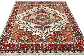 An oriental carpet, c. 296 x 238 cm.