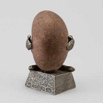 HENRY GUSTAFSSON, a stone and pewter sculpture, signed.