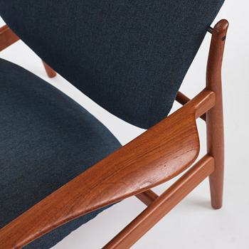 Finn Juhl, a pair of "FD 136" easy chairs, France & Daverkosen, Denmark, 1950s.