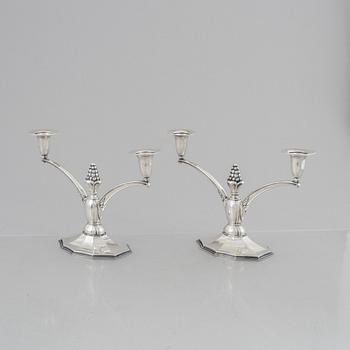 A pair of silver candelabra, Swedish import marks, probably 1920's/30's.