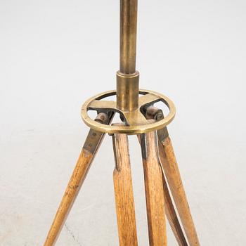 A brass and leahter tube binocular with stand around 1900.