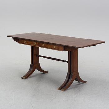 A mahogany dining table with folding and additional leaves, Nordiska Kompaniet, designed 1945.