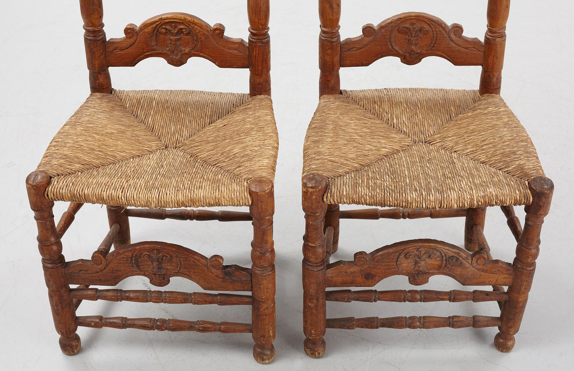 A pair of Spanish colonial style ladder-back chairs, circa 1900.