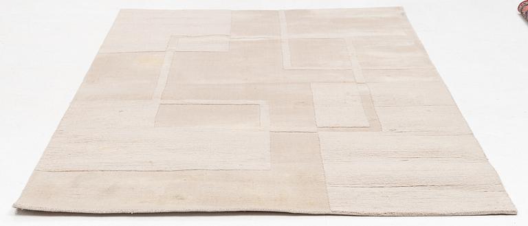 A 'Swedish Grace' carpet, Layered, cox. 270 x 180 cm.