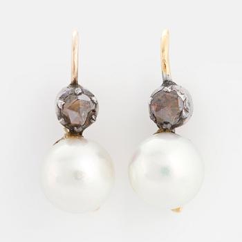 A pair of pearl and rose-cut diamond earrings.