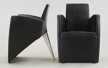 A pair of  Philippe Starck black leather armchairs, 'J Serie Lang', Aleph, Italy.