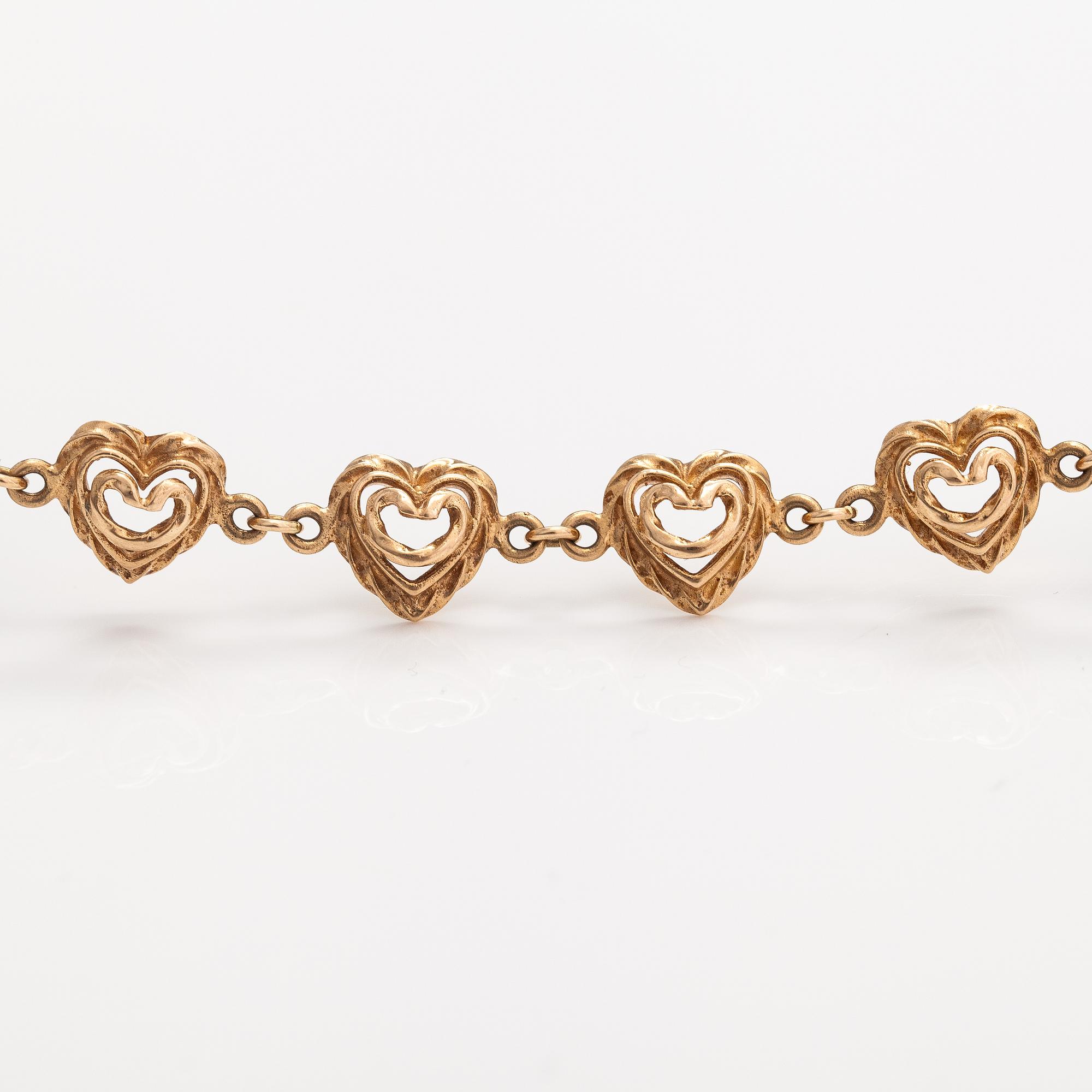 Tony Granholm, A 14K gold bracelet "Heart of the house". Kalevala koru, Helsinki 2002.
