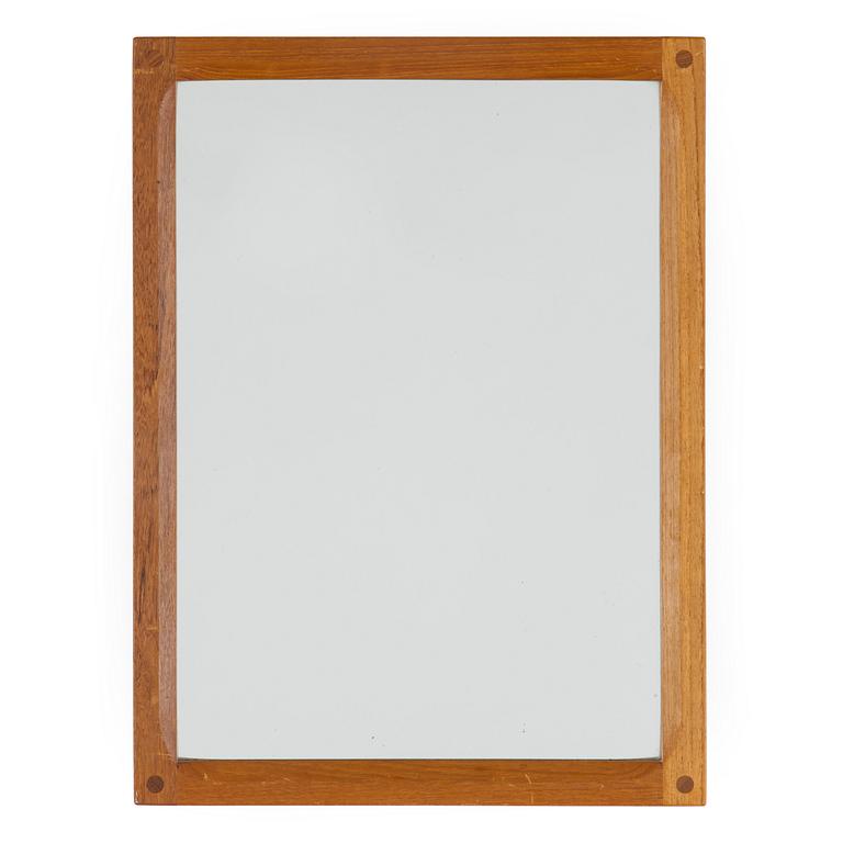 A teak mirror by Aksel Kjersgaard, Odder, Denmark.