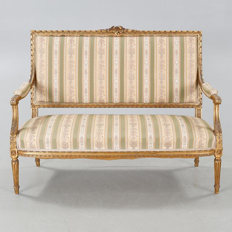 A Louis XVI style sofa from the first half of the 20th century.