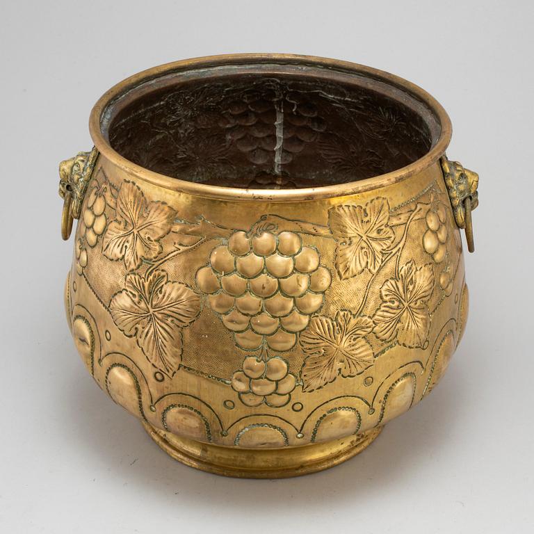 A 19th century large brass flower pot.
