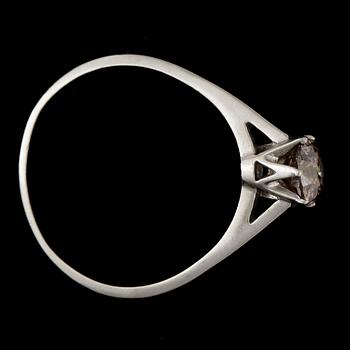 RING, 14k guld med cognacsfärgad, briljantslipad diamant ca 0,8 ct. Vikt ca 2,8 gram.