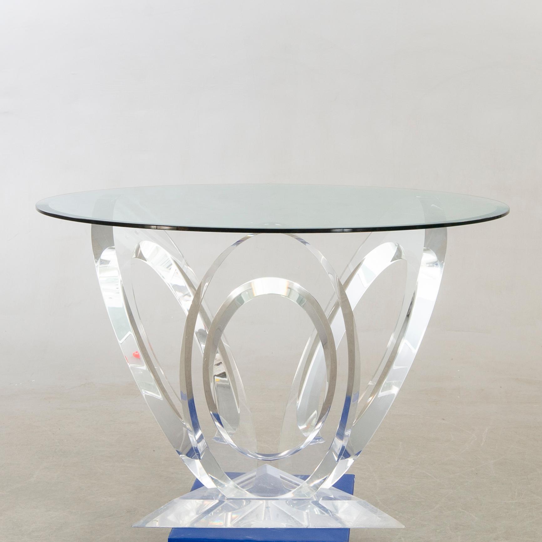 A Mikhail Loznikov signed glass and plexi dining table later part of the 20th century.