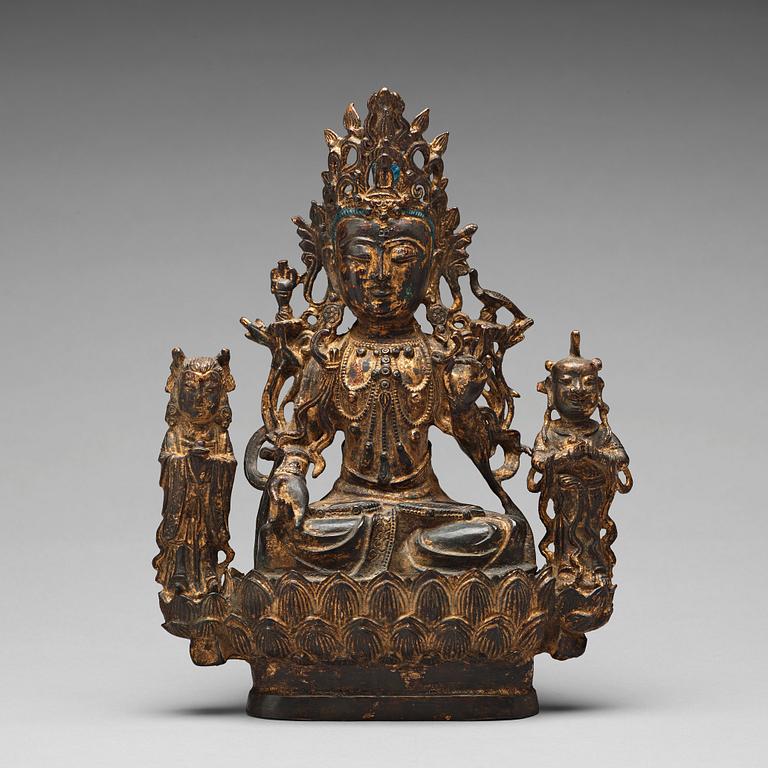 A bronze sculpture of boddhisattva and two attendants, Ming dynasty (1368-1644).