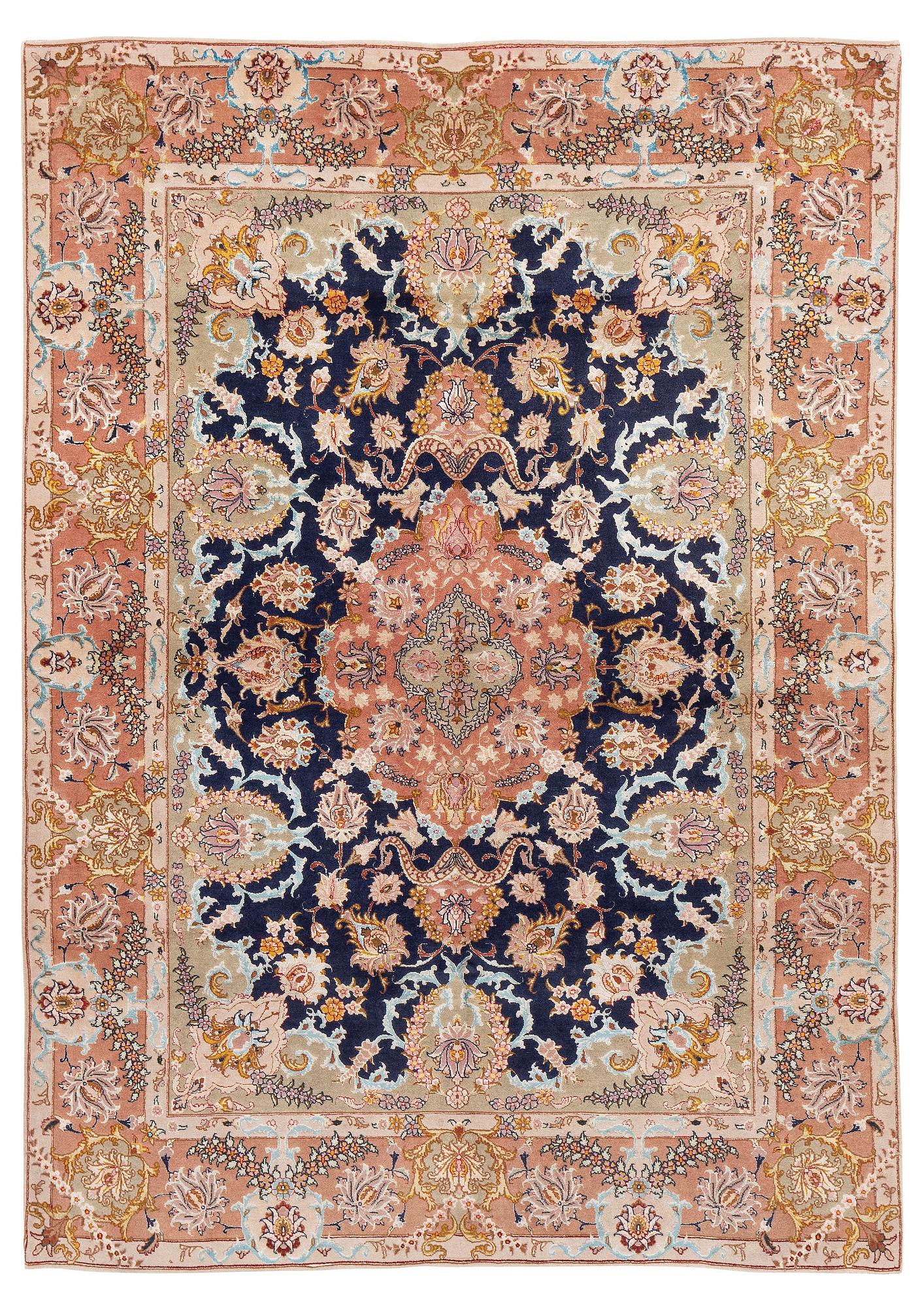 A Tabriz carpet, part silk, c. 206 x 147 cm.