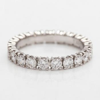 Cartier, a platinum and brilliant-cut diamond eternity ring.