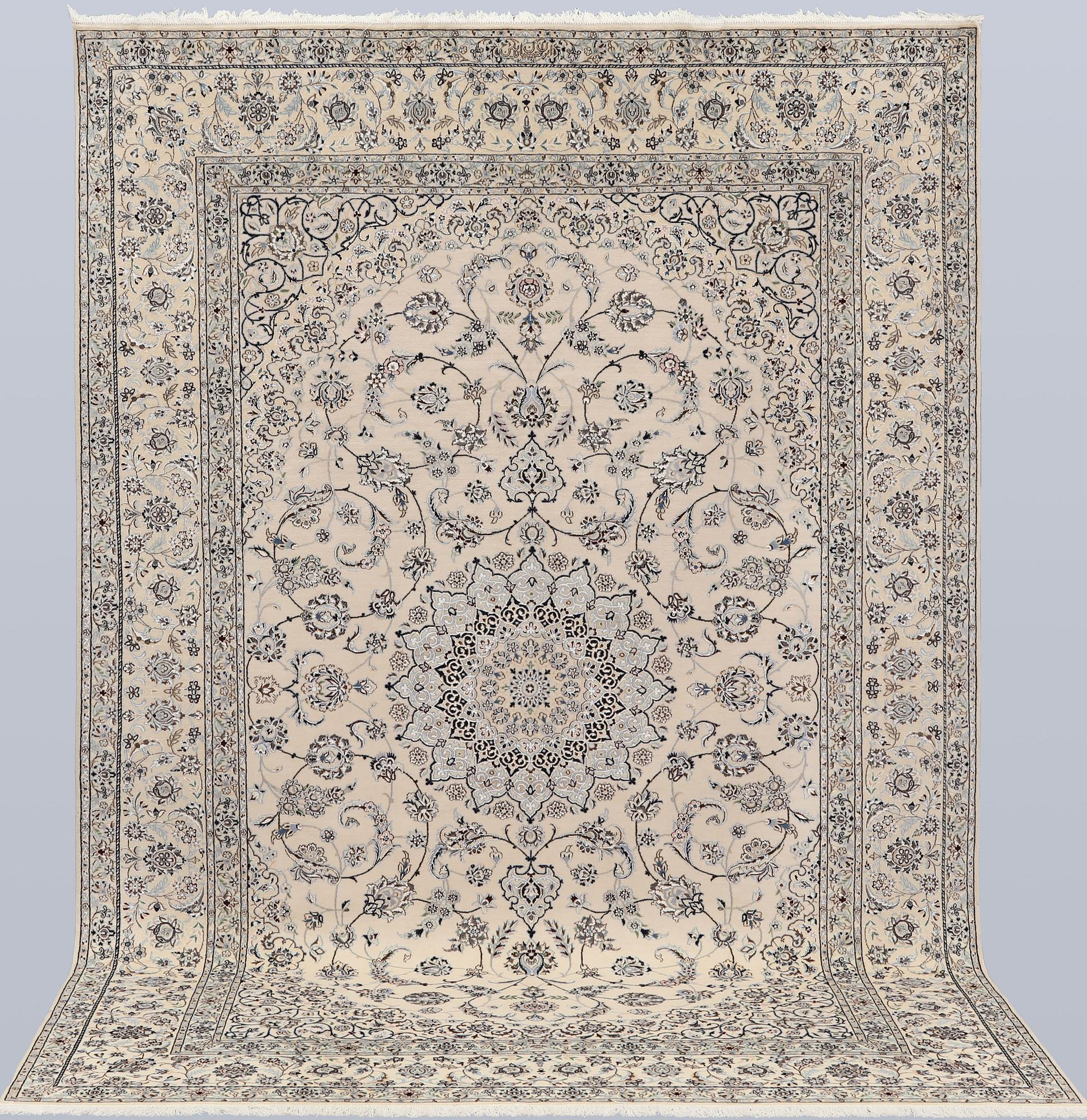 A Nain, part silk carpet, 305 x 207 cm.
