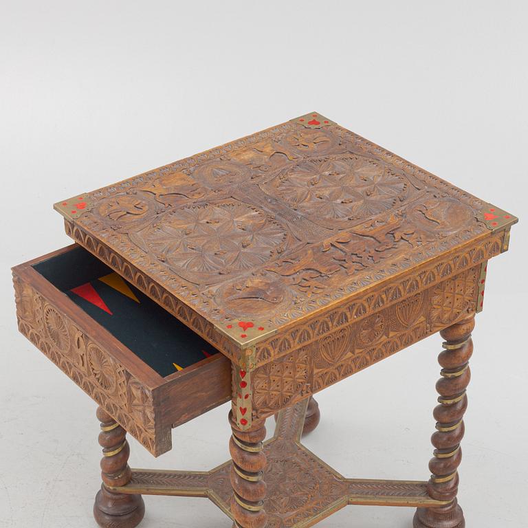 A Baroque style table with boardgames. 1900-tal.