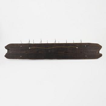 Urban Ström, a A wall relief, 'Trålare', signed, dated -88.