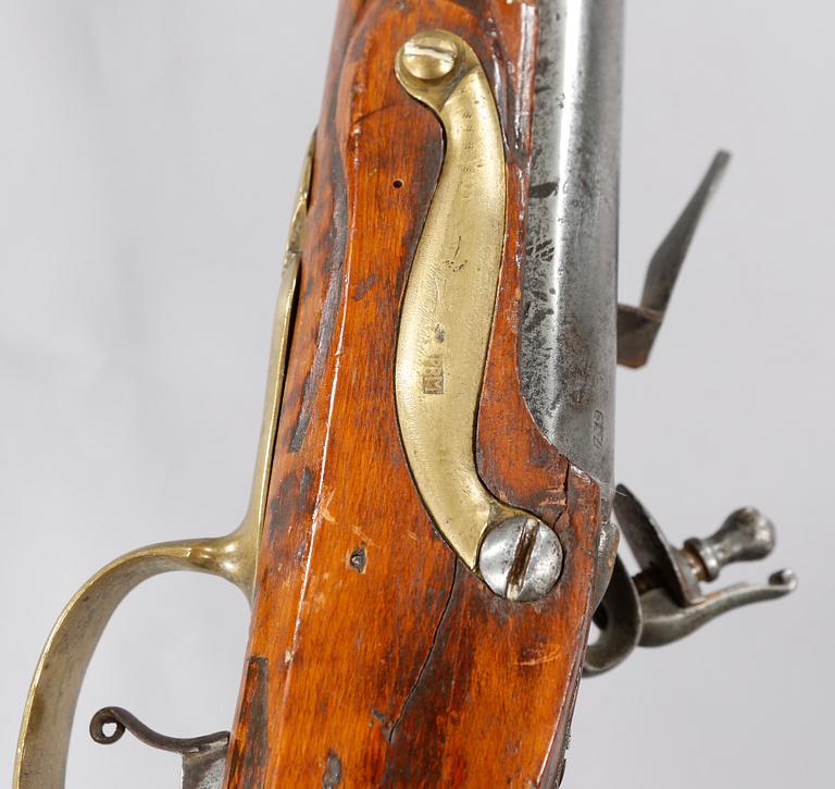 A flintlock rifle, 18th century.