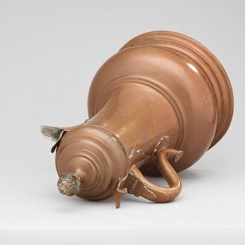 An 18th century copper tankard, presumably German.