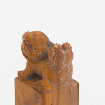 Two pieces of carved agalmatolite, sculpture and seal,one with stamp. China, mid-20th century.
