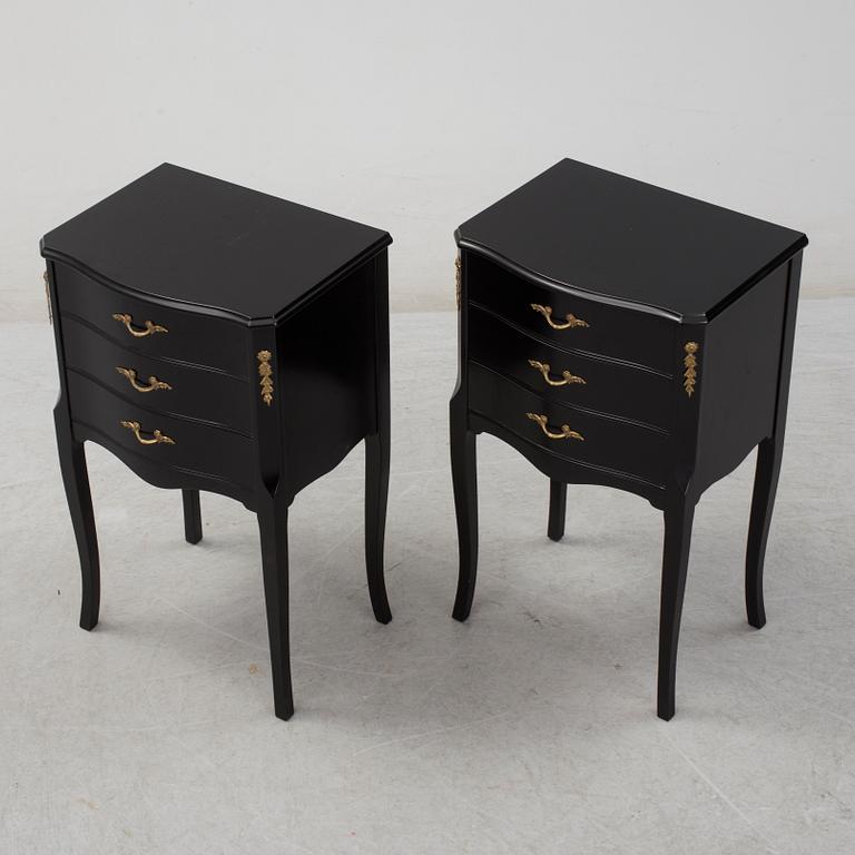 A pair of Rococo style bedside tables, second half of the 20th century.