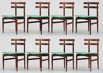 A Poul Hundevad palisander dining table with 8 chairs by Hundevad & Co, Denmark.