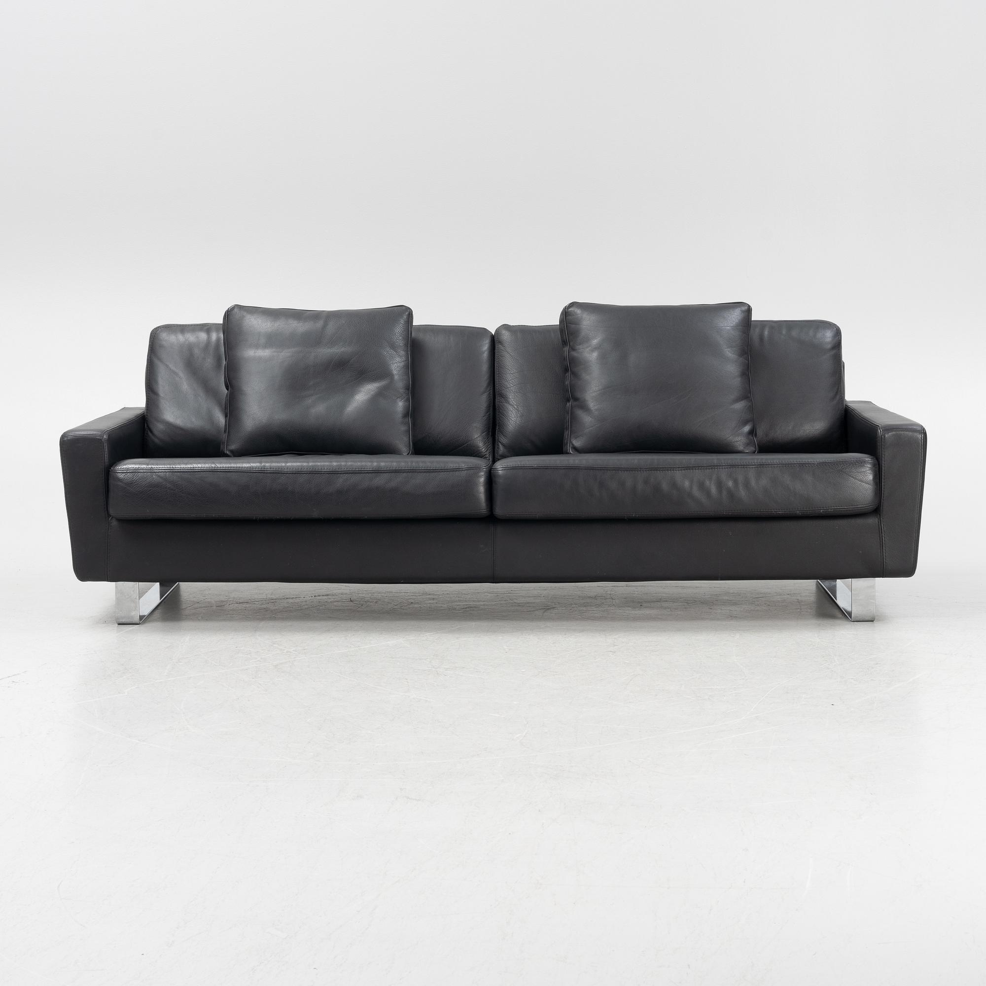 A leather upholstered sofa, Dux, 21st Century.