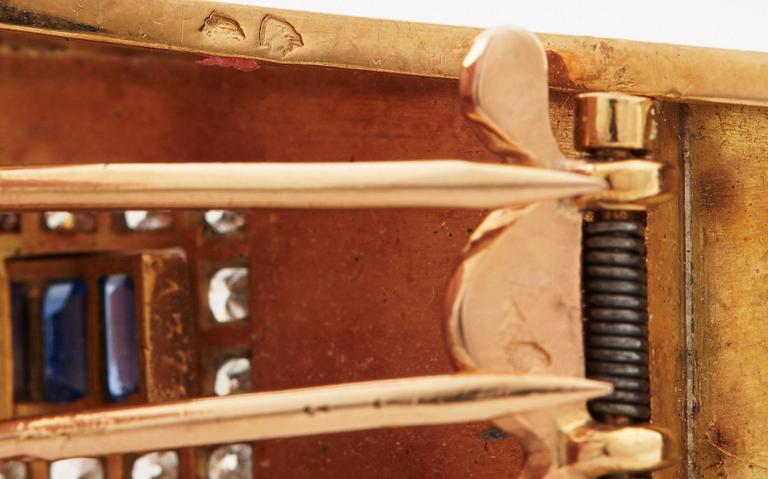 A pair of 1940/50's brooches by Boucheron, set with baguette cut sapphires, brilliant- and single cut diamonds.