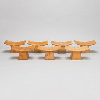 Seven late 20th century stools / meditation benches.