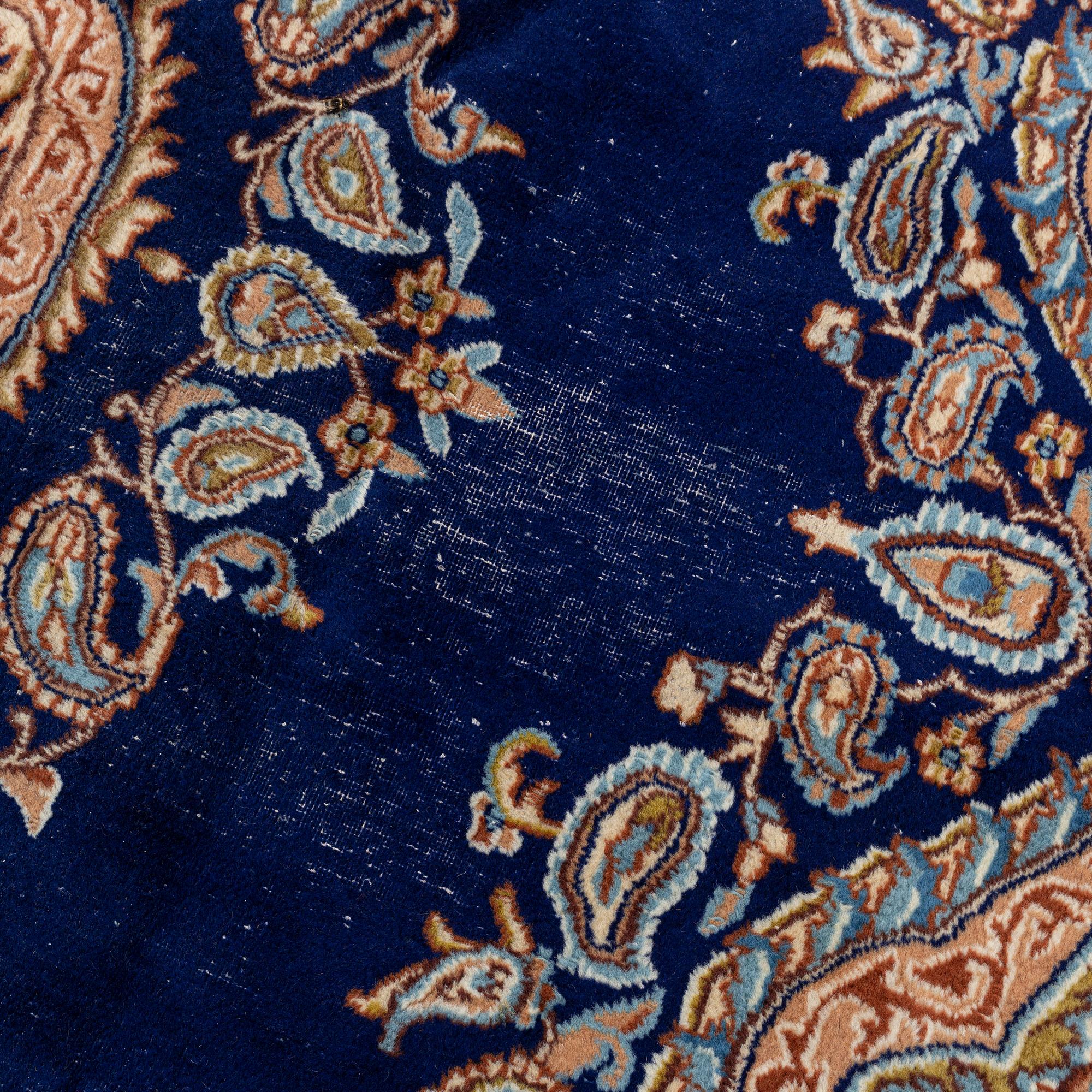 A Kerman carpet, circa 403 x 301 cm.