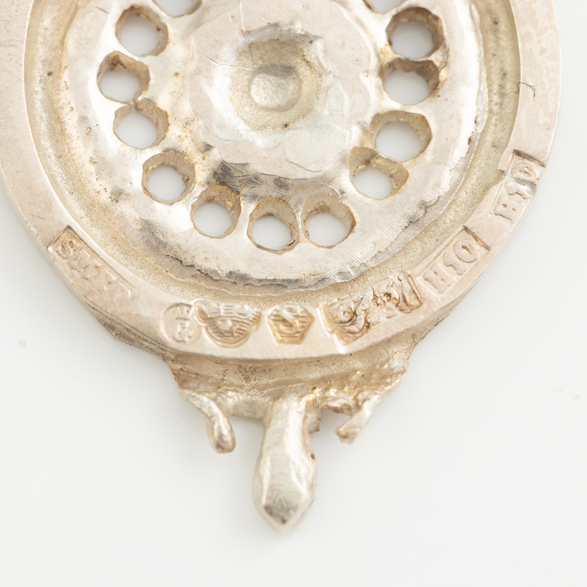 Lars Arby, a neck ring and seven pendants, silver, Gothenburg 1966, 1977 and 1982.