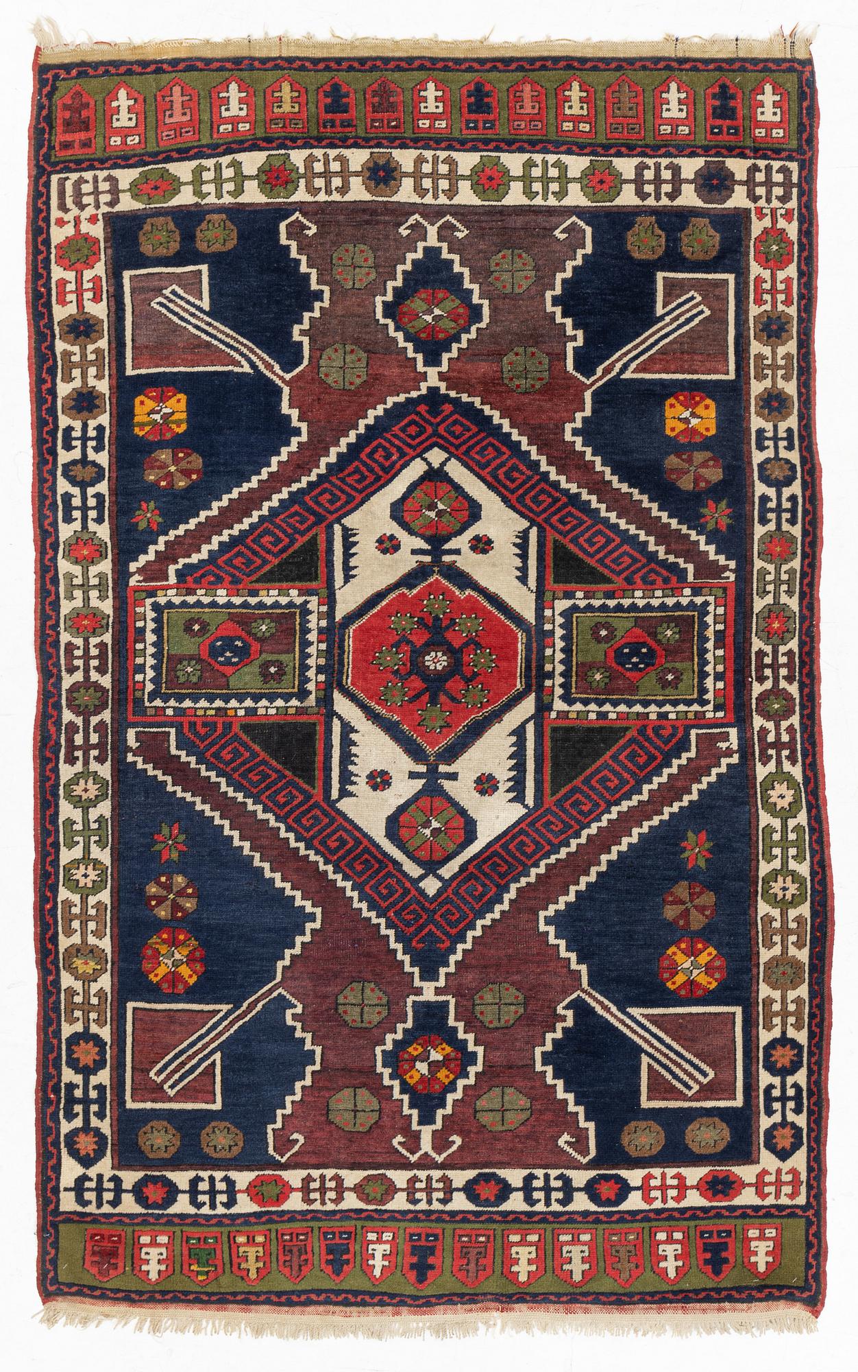 A likely old Anatol/Caucasus rug, c. 207 x 130 cm.