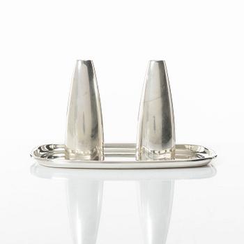 Salt and pepper shakers and tray, silver, including Henning Koppel for Georg Jensen, Denmark.