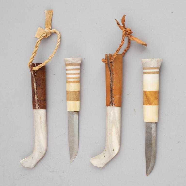 Per Henrik Simmas, two Sami reindeer horn knives, signed.