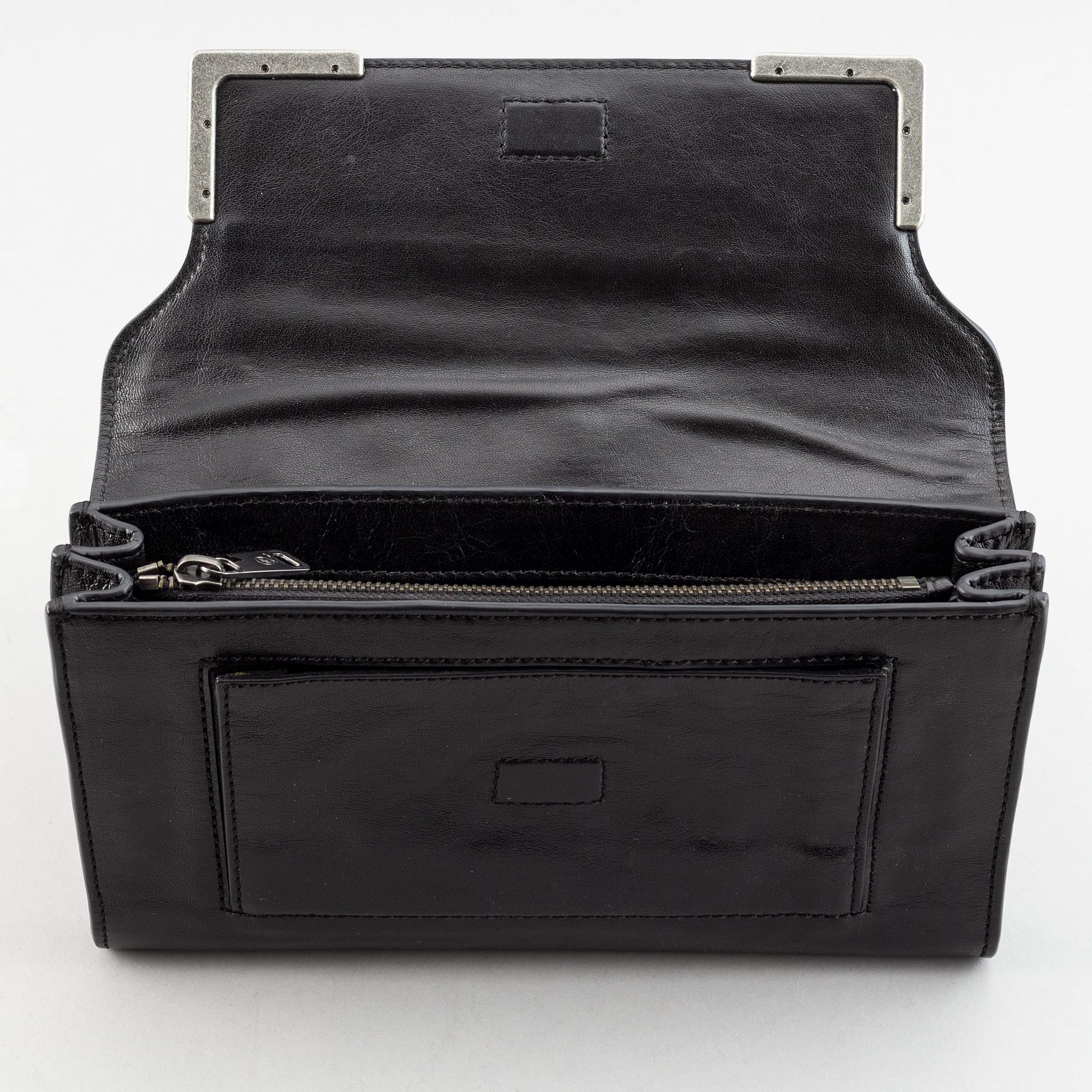 Alexander McQueen, clutch.