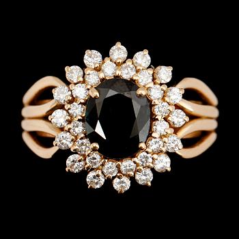 RING, 18 k guld, Stockholm JEG 1994, med safir ca 5.0 ct och briljanter tot 0.80 ct.