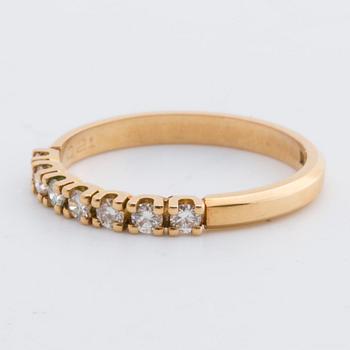 RING 18K gold w 7 brilliant-cut diamonds 0,21 ct engraved. Strömdahl Stockholm 1985.