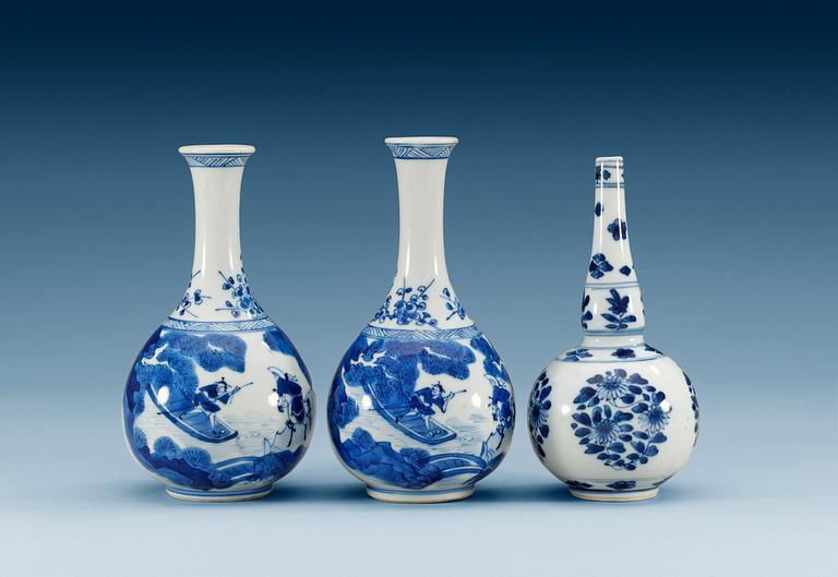 A pair of blue and white vases and a water sprinkler, Qing dynasty, Kangxi (1662-1722).