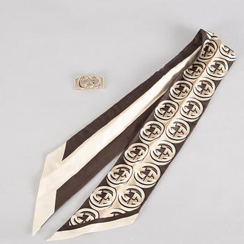 Gucci, bandana/scarf with jewellery.