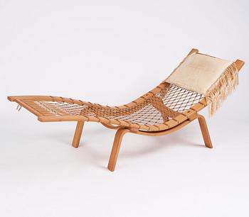 Hans J. Wegner, an oak chaise longue 'Hammock Chair GE2', Getama, Denmark, early 1960s.