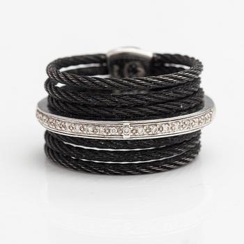 An 18K white gold and steel ring with diamonds ca. 0.095 ct in total. Charriol.