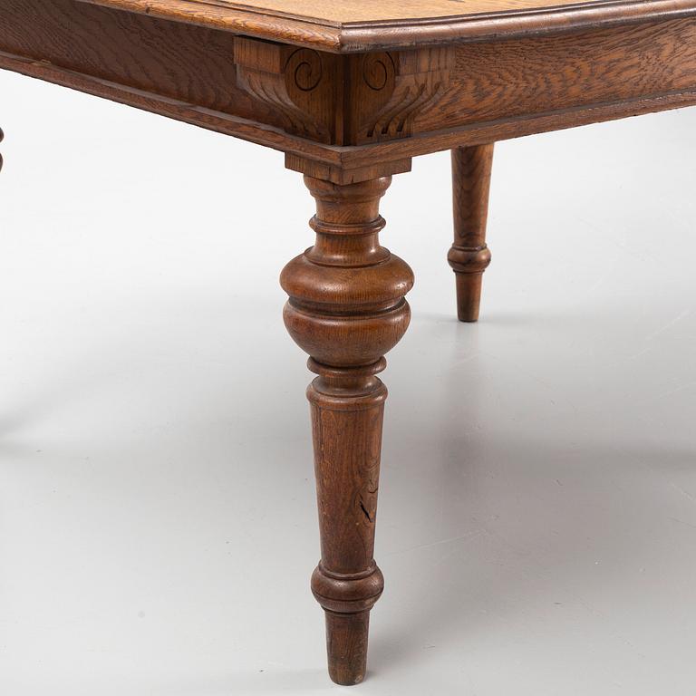 A dining table, late 19th Century.