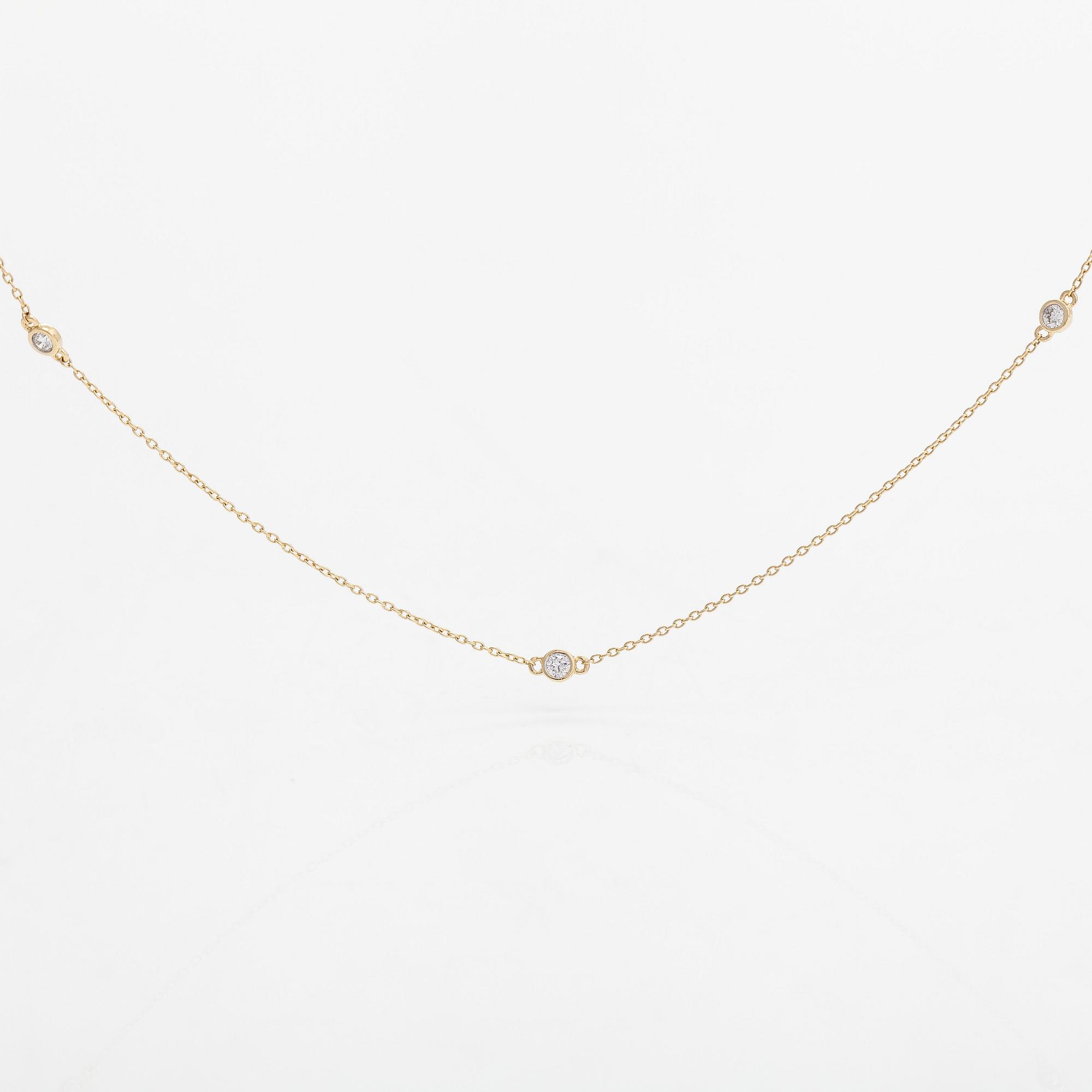 Halsband, 14K guld och diamanter ca 0.15 ct totalt.