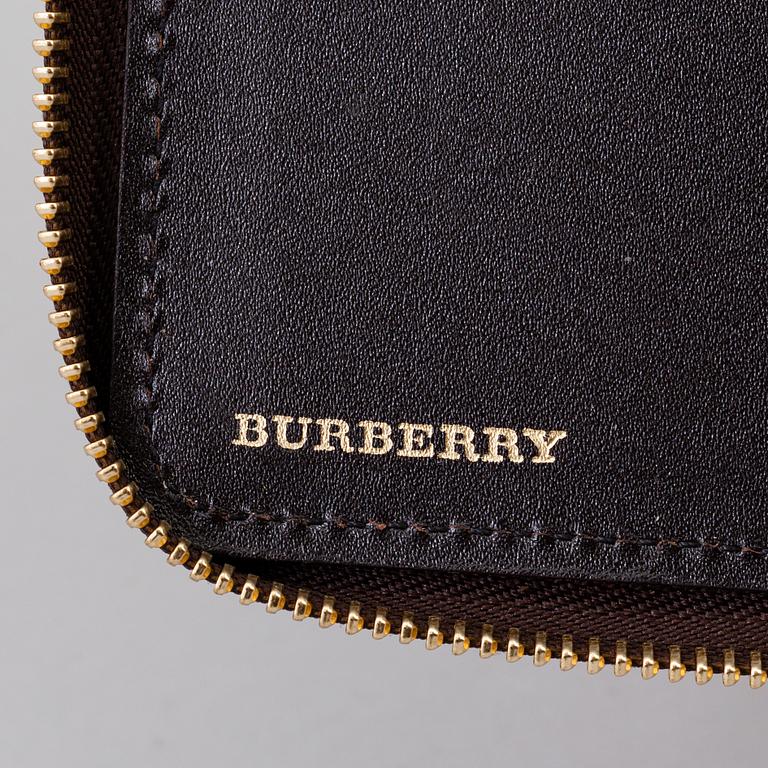 An ipad case by Burberry.