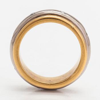 An 18K white/yellow gold ring, diamonds totalling approximately 0.24 ct. Henri Pitkänen, Helsinki.