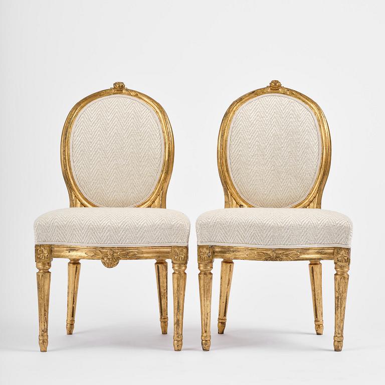 A pair of Gustavian giltwood chairs, Stockholm, late 18th century.