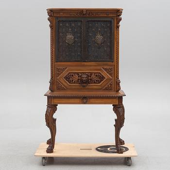 A Baroque style drinks cabinet, first half of the 20th Century.