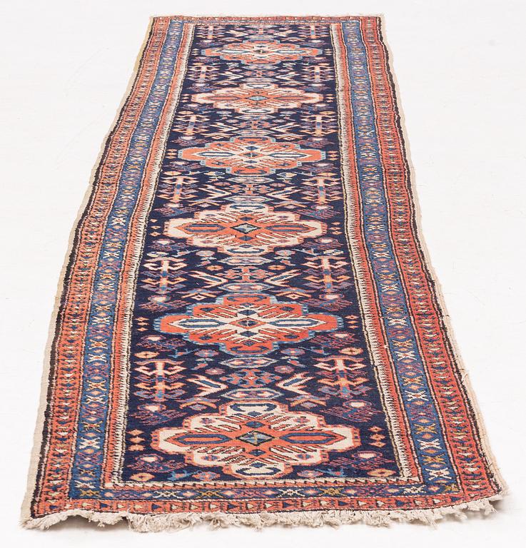 A runner carpet, Northwest Persian, circa 328 x 80 cm.