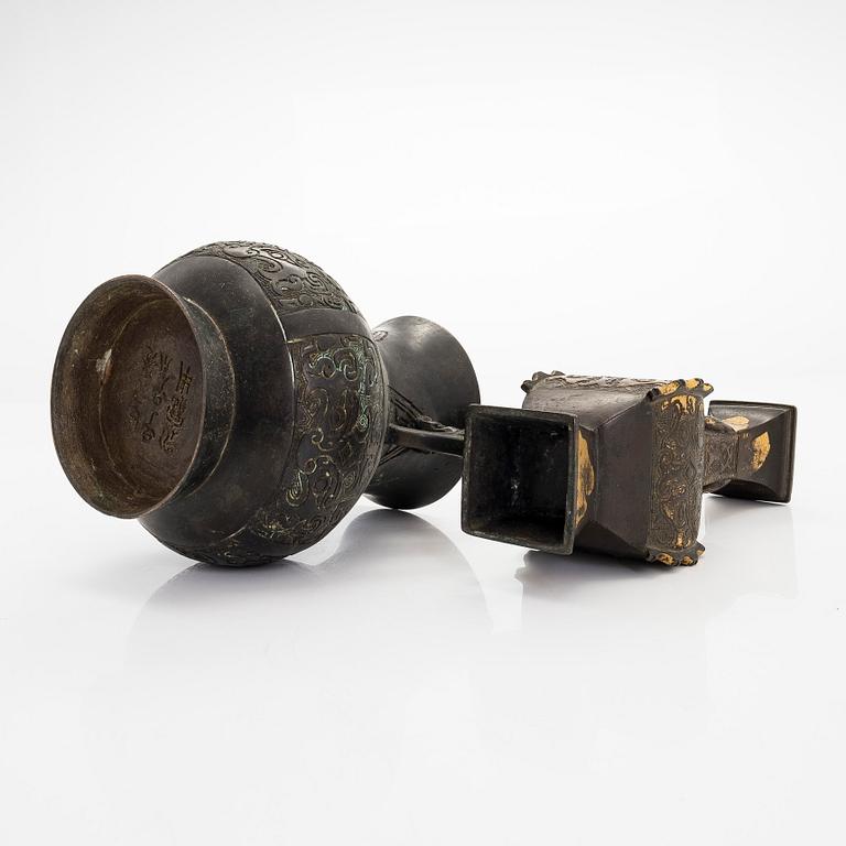 Two bronze vases, one late Qing dynasty and one 20th century.